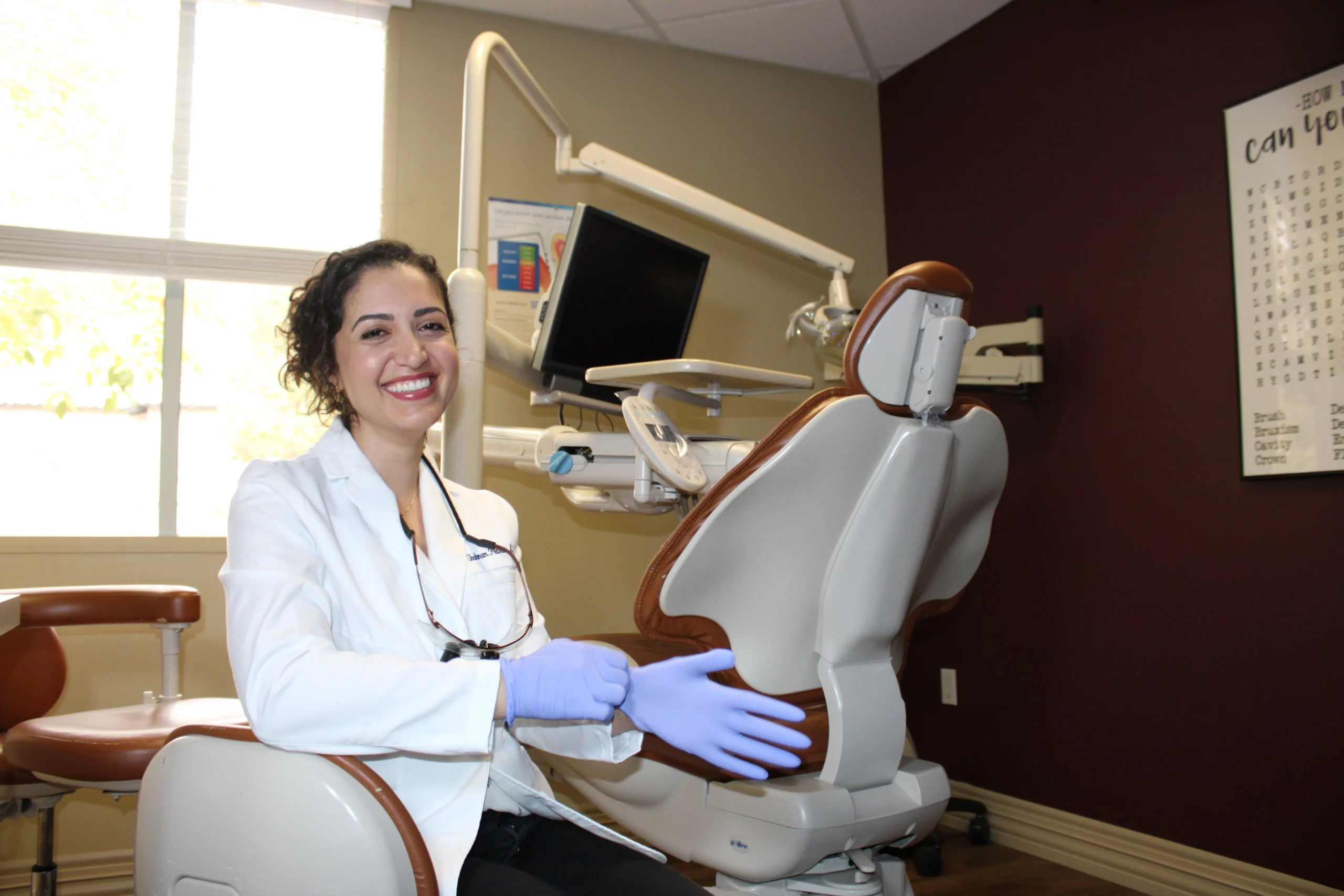 Dr. Shabnam Pedram at Gentle Dentistry of Poway showing a patient digital dental images during a consultation in Poway, CA